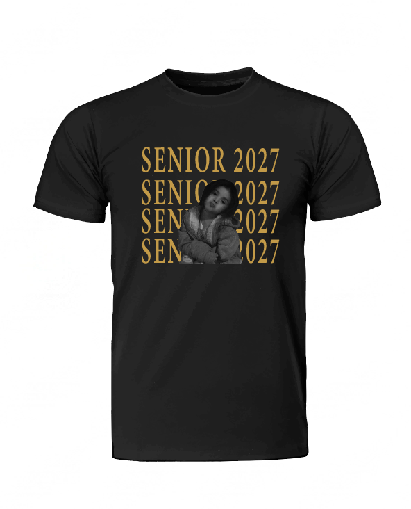A black short-sleeve t-shirt with a graphic print on the front. The design features the text 'SENIOR 2027' repeated vertically in a gold/yellow color, overlaid with a black-and-white photo of a young boy.